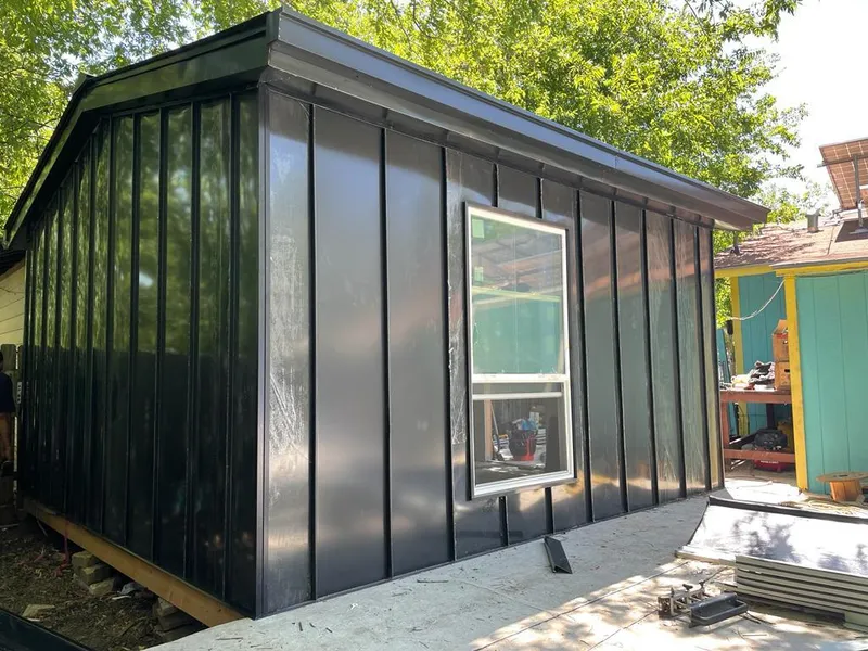 Black standing seam metal wall panels for Roof Inspection in Sturbridge