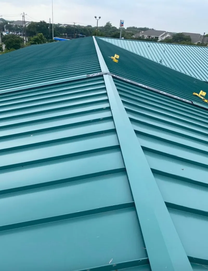 Green commercial metal roof ridge and valley for Metal Roof Repair in Sturbridge