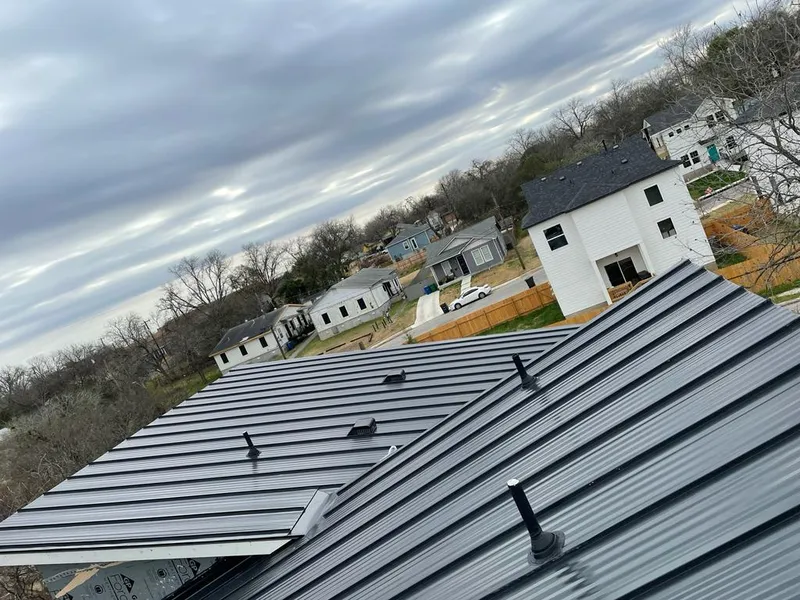 Standing seam metal roof panels with vents for Skylight Repair in Sturbridge
